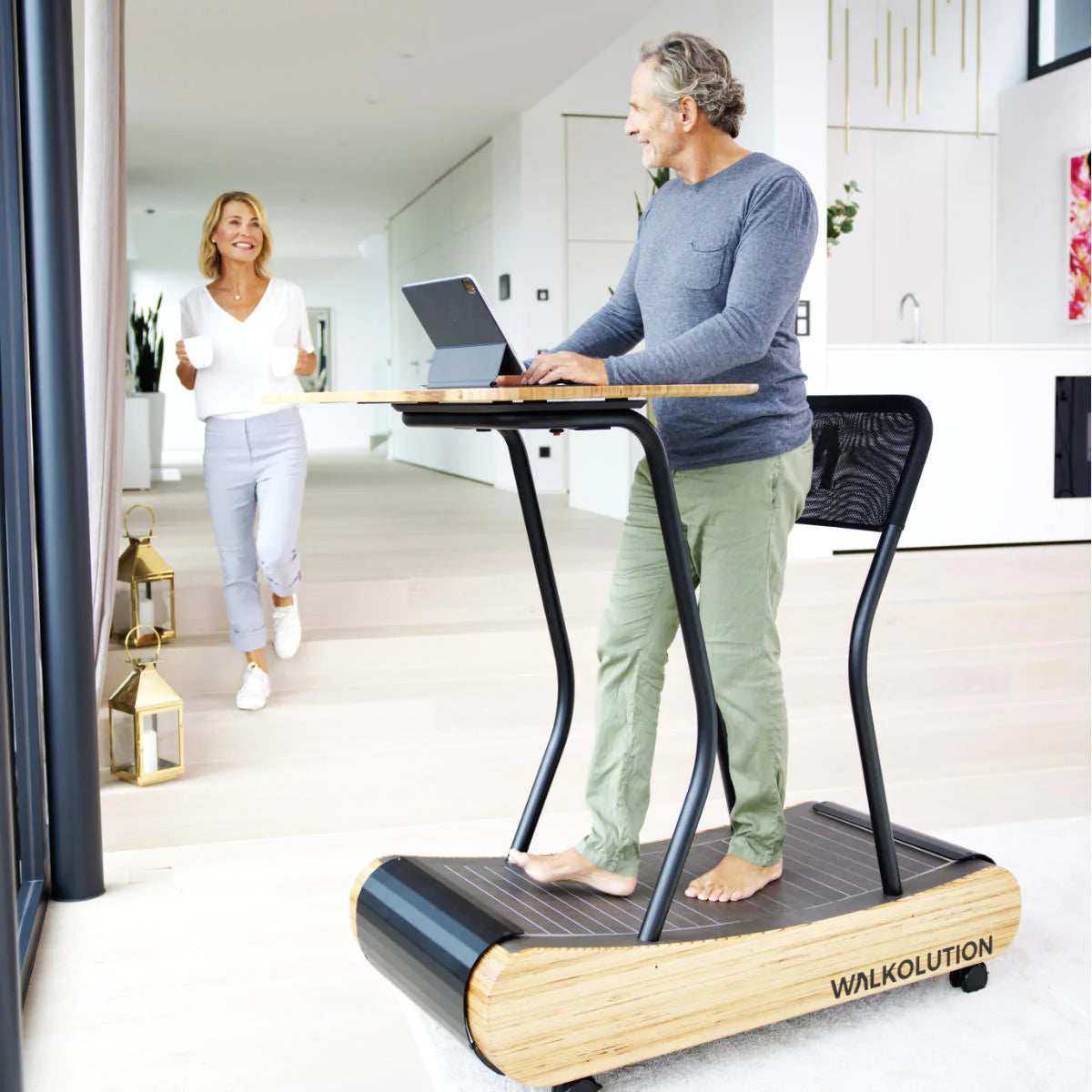 Man using treadmill desk in home office Walkolution USA